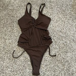 Dark brown , one piece bathing suit